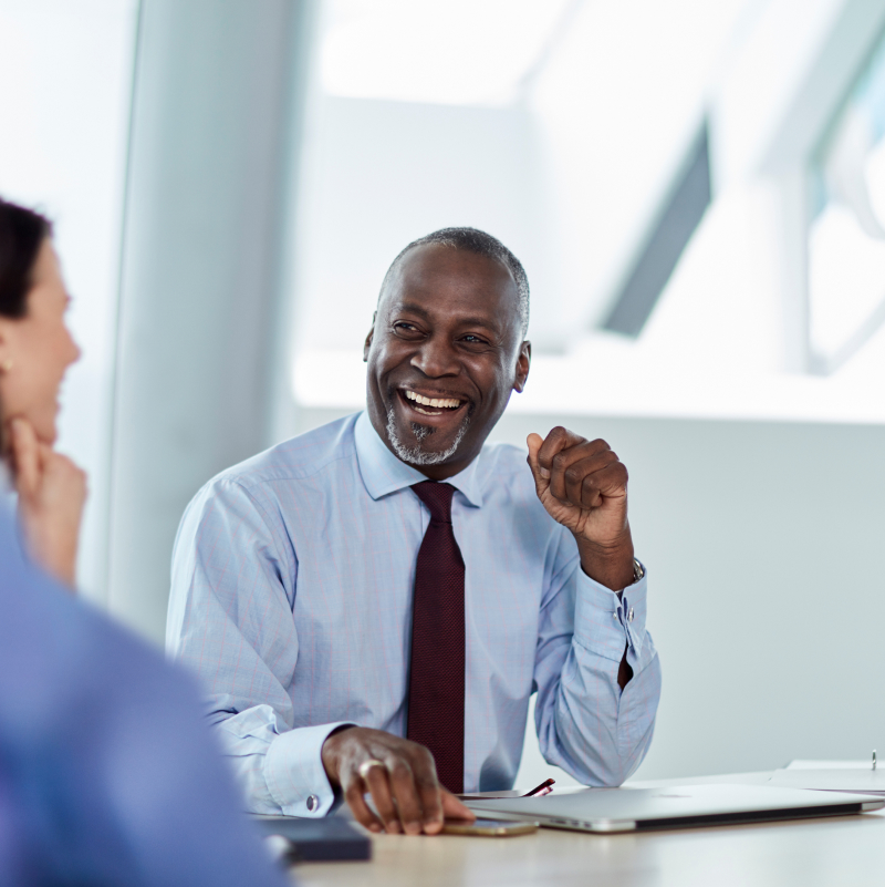 business owner talking with employee